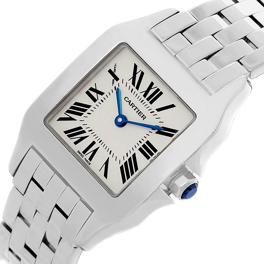 This image shows a Cartier Santos Demoiselle W25065Z5 Women's Stainless Steel Silver Dial W25065Z5 Women's Stainless Steel Silver Dial watch at an oblique angle, highlighting the face, Roman numerals, bracelet, and crown.