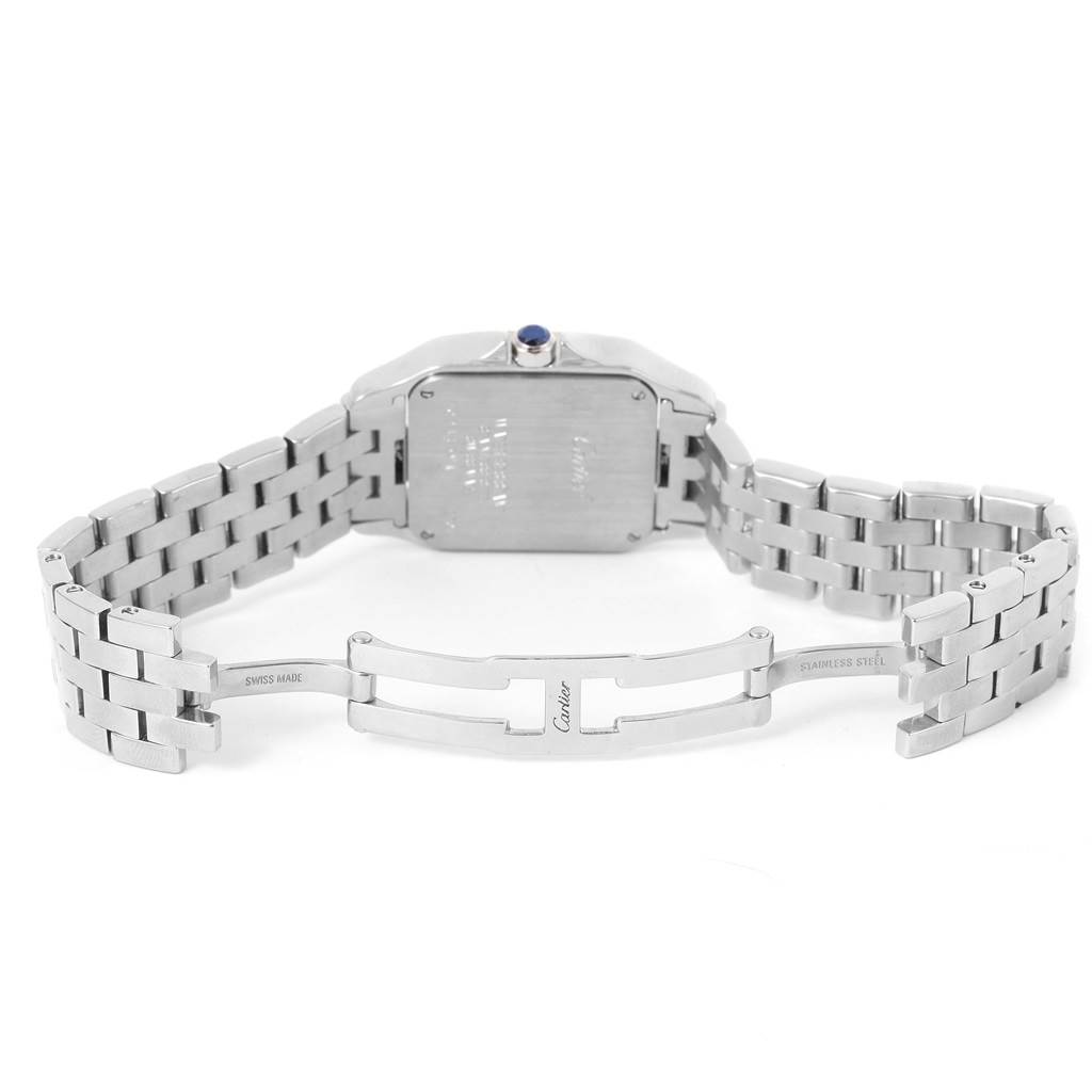 The image shows the backside of the Santos Demoiselle model by Cartier, highlighting its bracelet and clasp.