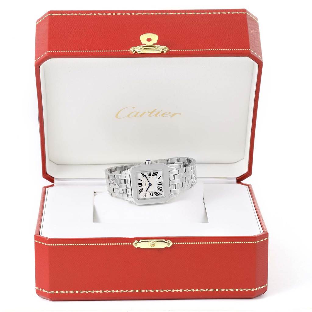 The image shows the Cartier Santos Demoiselle W25065Z5 Women's Stainless Steel Silver Dial W25065Z5 Women's Stainless Steel Silver Dial watch displayed in its open red and white box.