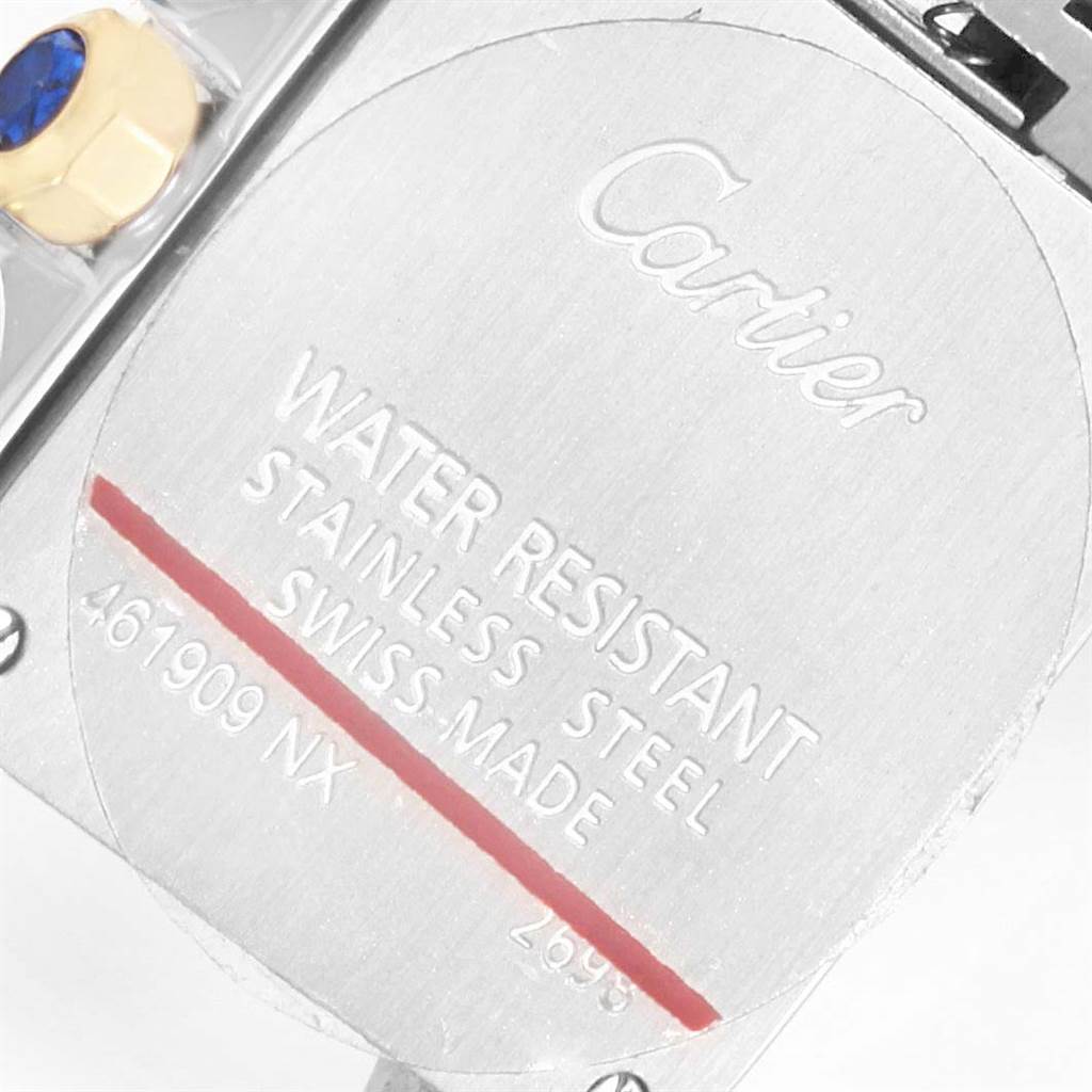 This image shows the back case of the Cartier Santos Demoiselle W25066Z6 Women's Steel and Gold (two tone) Silver Dial W25066Z6 Women's Steel and Gold (two tone) Silver Dial watch, including the brand name and specifications.