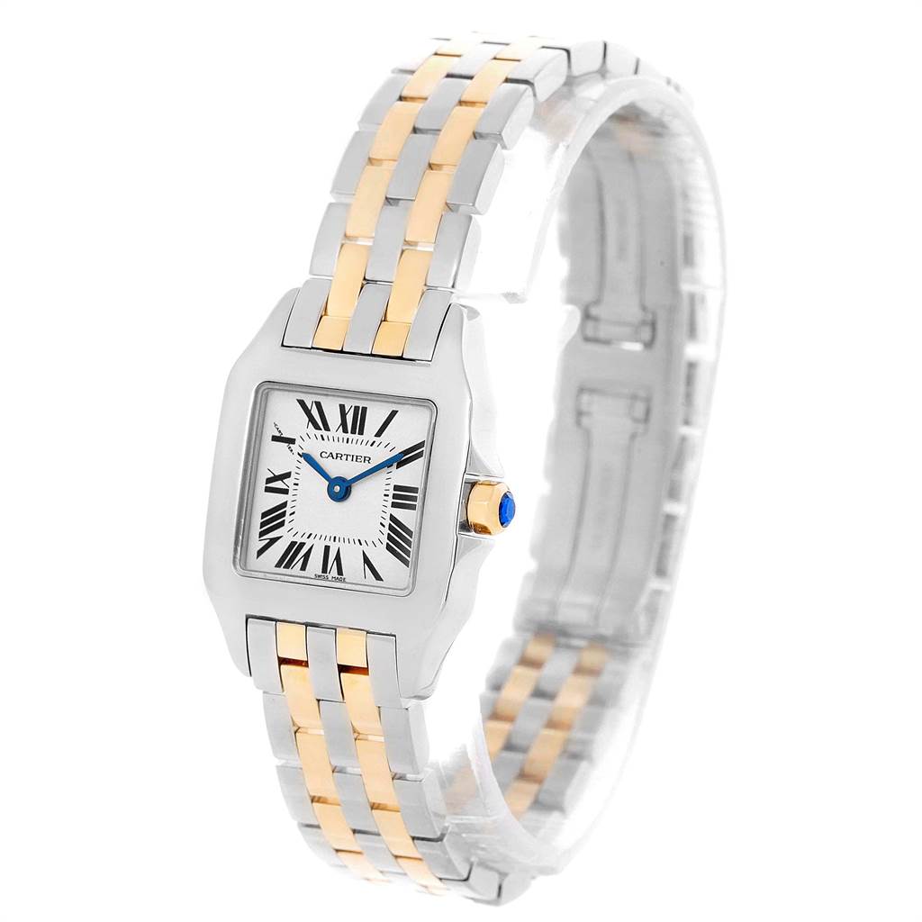 The Cartier Santos Demoiselle W25066Z6 Women's Steel and Gold (two tone) Silver Dial W25066Z6 Women's Steel and Gold (two tone) Silver Dial watch is shown from a front angle, displaying the face, bezel, and two-tone metal bracelet.