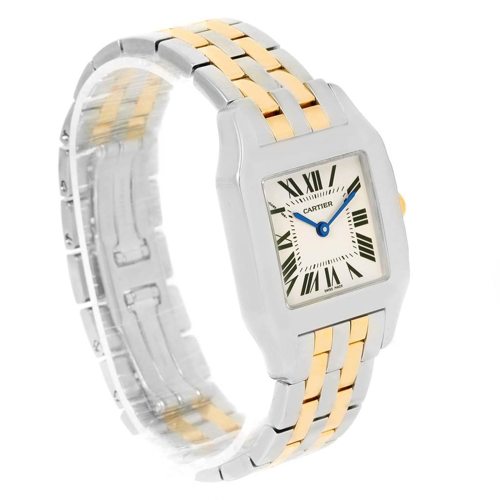 The image shows a Cartier Santos Demoiselle W25067Z6 Women's Steel and Gold (two tone) Silver Dial W25067Z6 Women's Steel and Gold (two tone) Silver Dial watch viewed from a slightly tilted angle, displaying its face and two-tone metal bracelet.