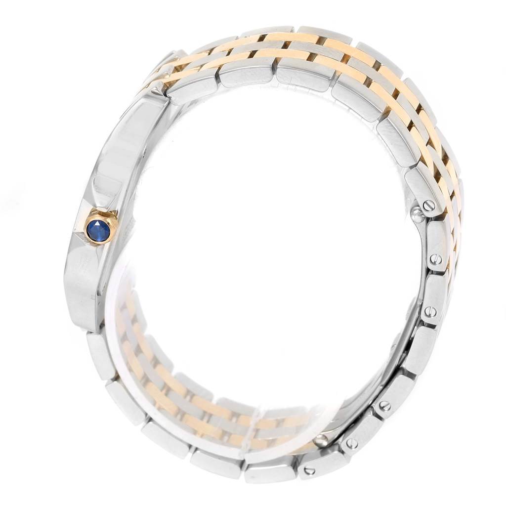 This image shows a side view of the bracelet and the crown of the Cartier Santos Demoiselle W25067Z6 Women's Steel and Gold (two tone) Silver Dial W25067Z6 Women's Steel and Gold (two tone) Silver Dial watch, showcasing its two-tone design.