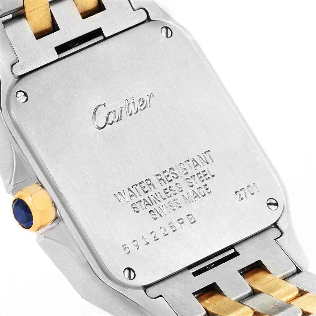 The image shows the back case and part of the bracelet of the Santos Demoiselle model by Cartier.