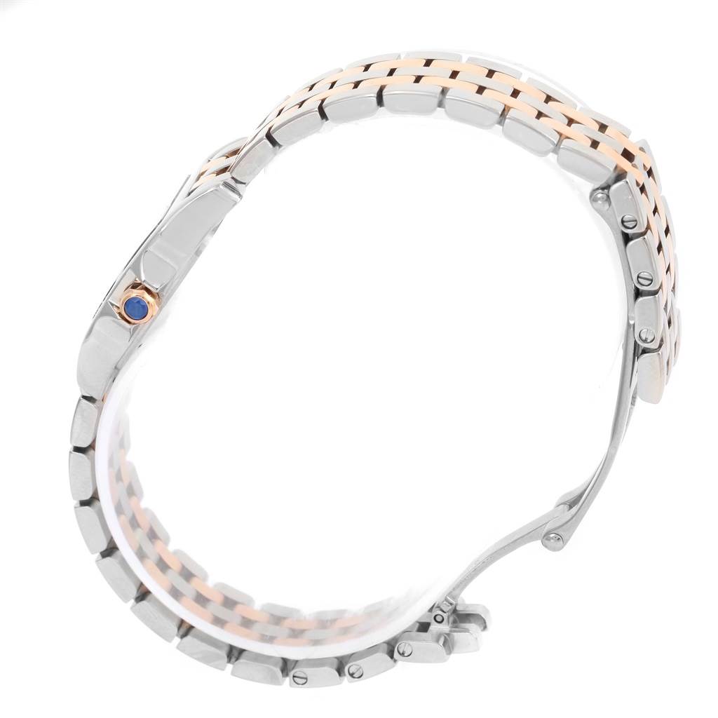 The image shows the side view of the bracelet and crown of the Cartier Santos Demoiselle W25074Y9 Women's Steel and Gold (two tone) Mother of Pearl Dial W25074Y9 Women's Steel and Gold (two tone) Mother of Pearl Dial model watch.