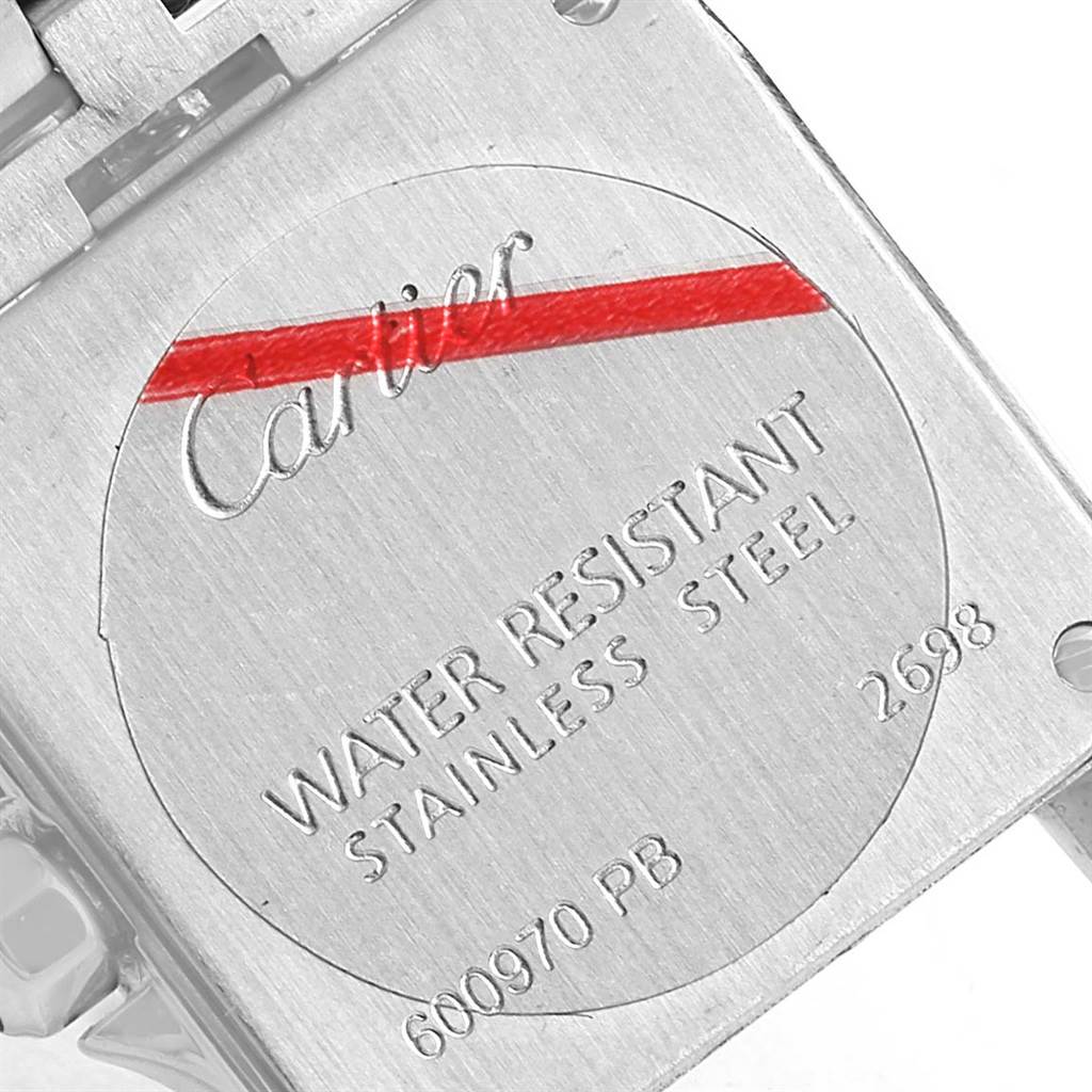 The image shows the backside of the Santos Demoiselle watch by Cartier, highlighting its water resistance and stainless steel material.
