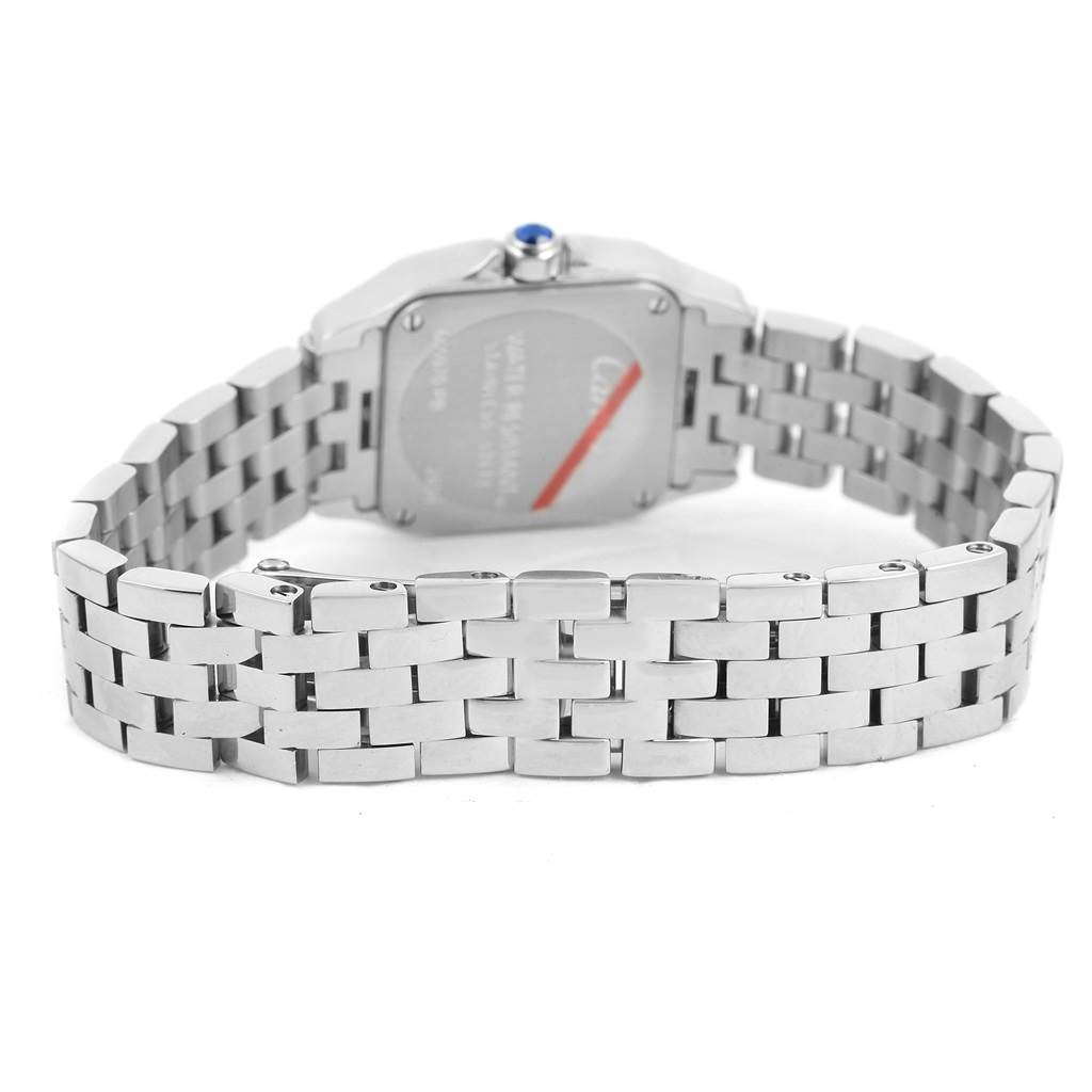 The image shows the back of a Santos Demoiselle model by Cartier, highlighting its bracelet and case back.