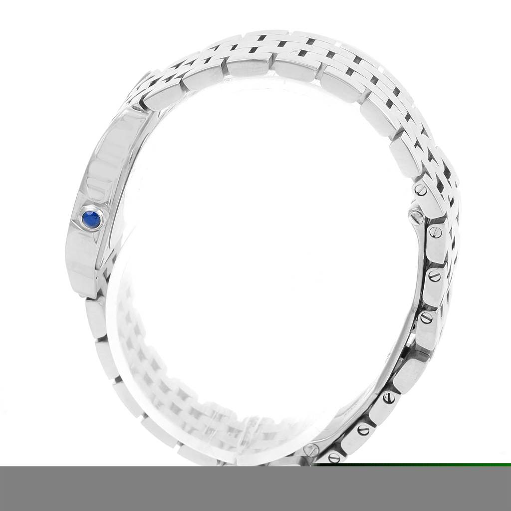 The image shows the side view of the bracelet and crown with a blue cabochon of the Santos Demoiselle model by Cartier.