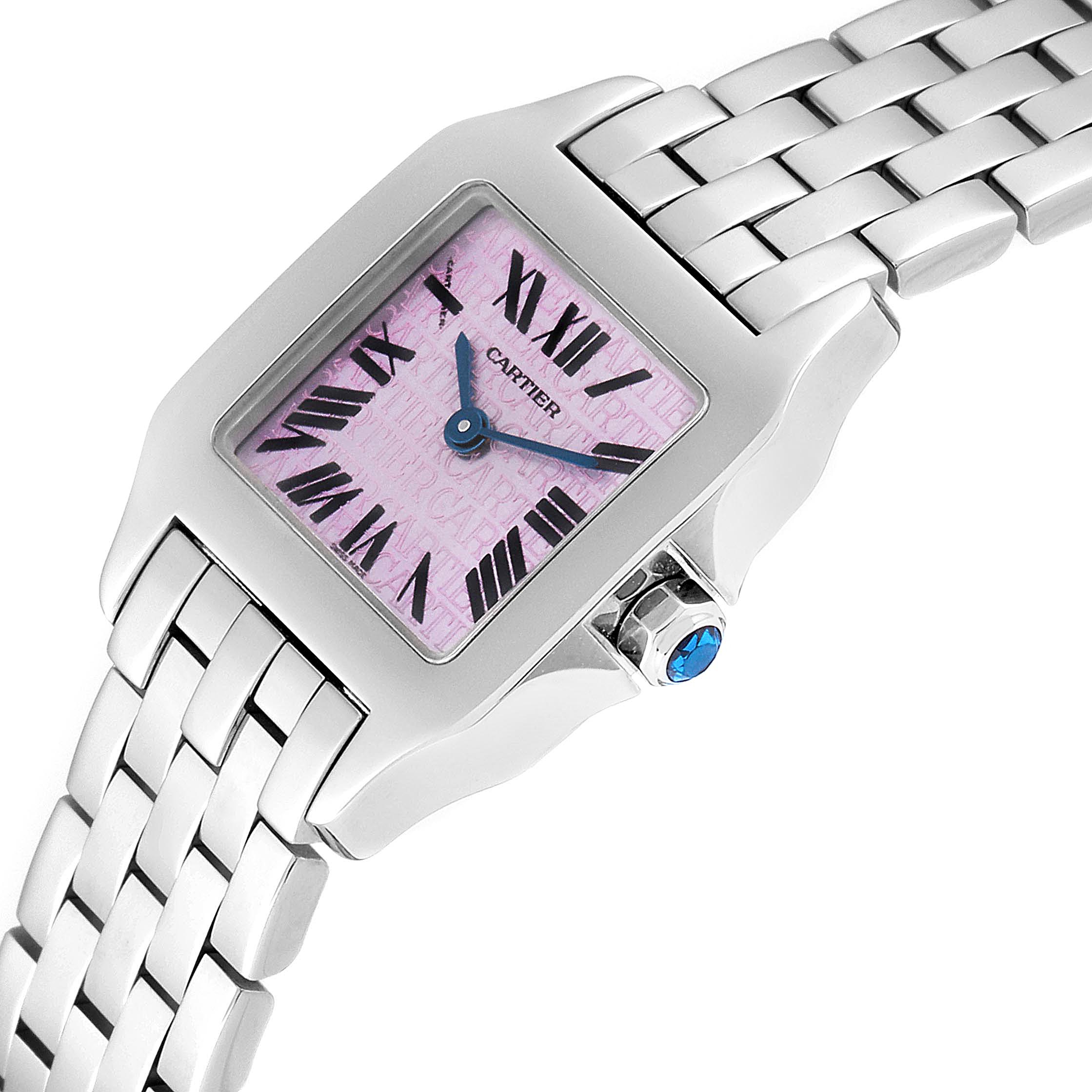 The image shows a Cartier Santos Demoiselle W2510002 Women's Stainless Steel Purple Dial W2510002 Women's Stainless Steel Purple Dial watch from an angled side view, highlighting its pink face, Roman numerals, and metal bracelet.