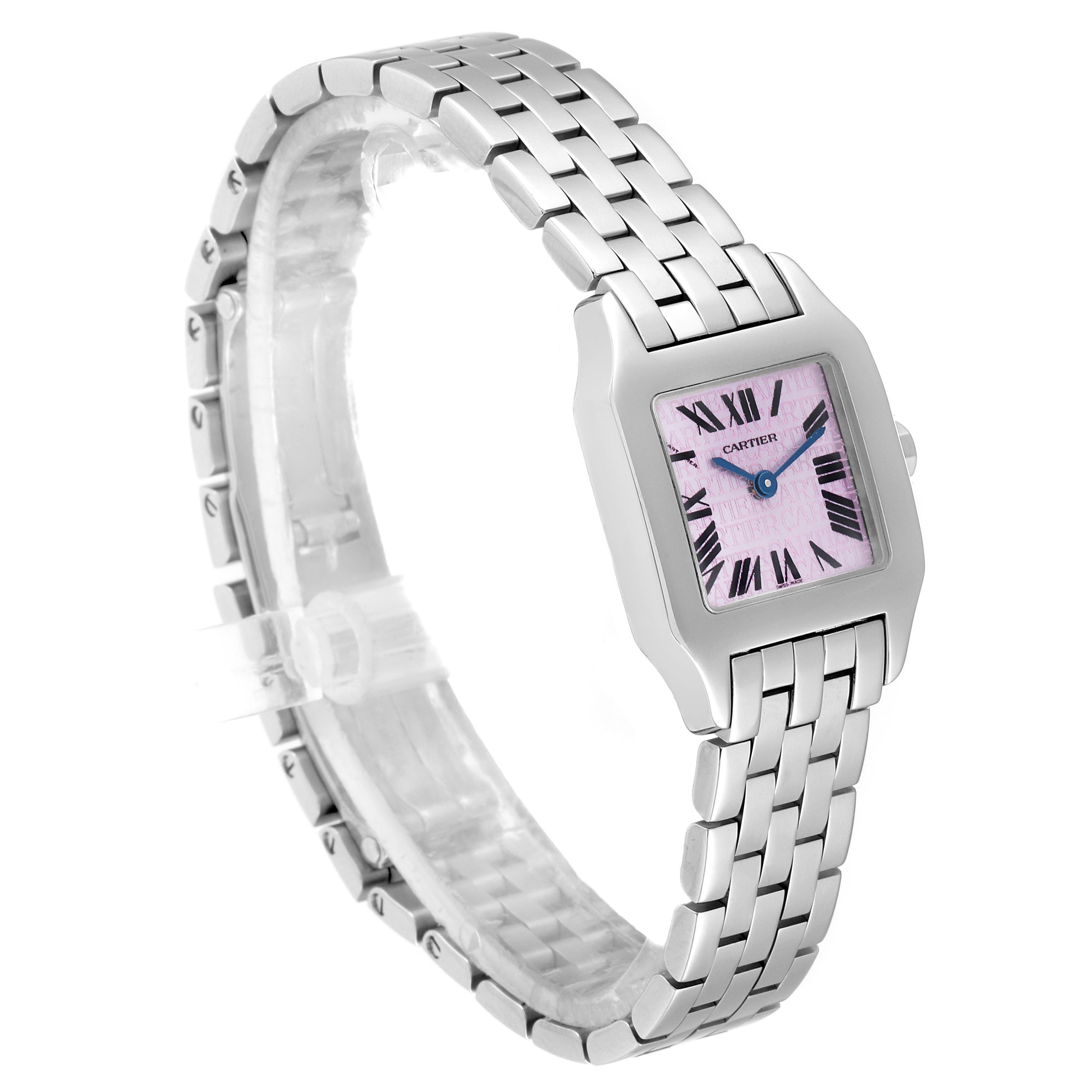 The image shows a Santos Demoiselle watch by Cartier from a slight side angle, highlighting its bracelet and pink dial with Roman numerals.