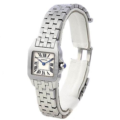 The image shows a side angle of the Santos Demoiselle watch by Cartier, highlighting the face, bracelet, and crown.