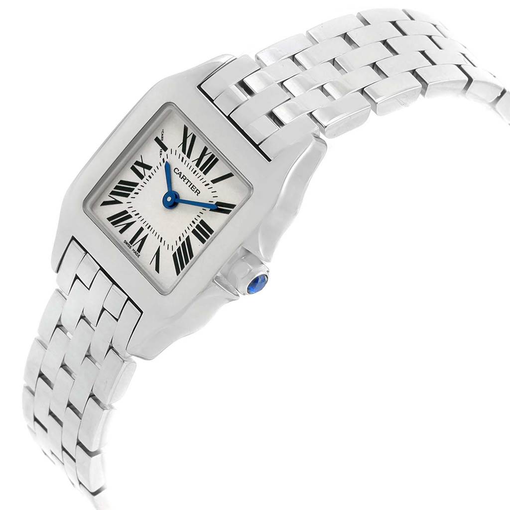 The image shows a close-up angled view of a Cartier Santos Demoiselle W25064Z5 Women
s Stainless Steel Silver Dial W25064Z5 Women
s Stainless Steel Silver Dial watch, highlighting the face, crown, and stainless steel bracelet.