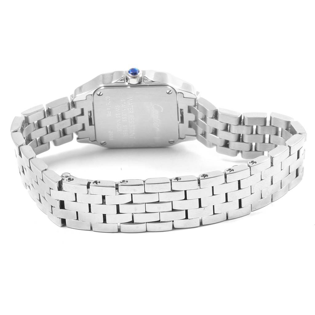 The image shows the back of the Santos Demoiselle model by Cartier, focusing on the case back and bracelet.