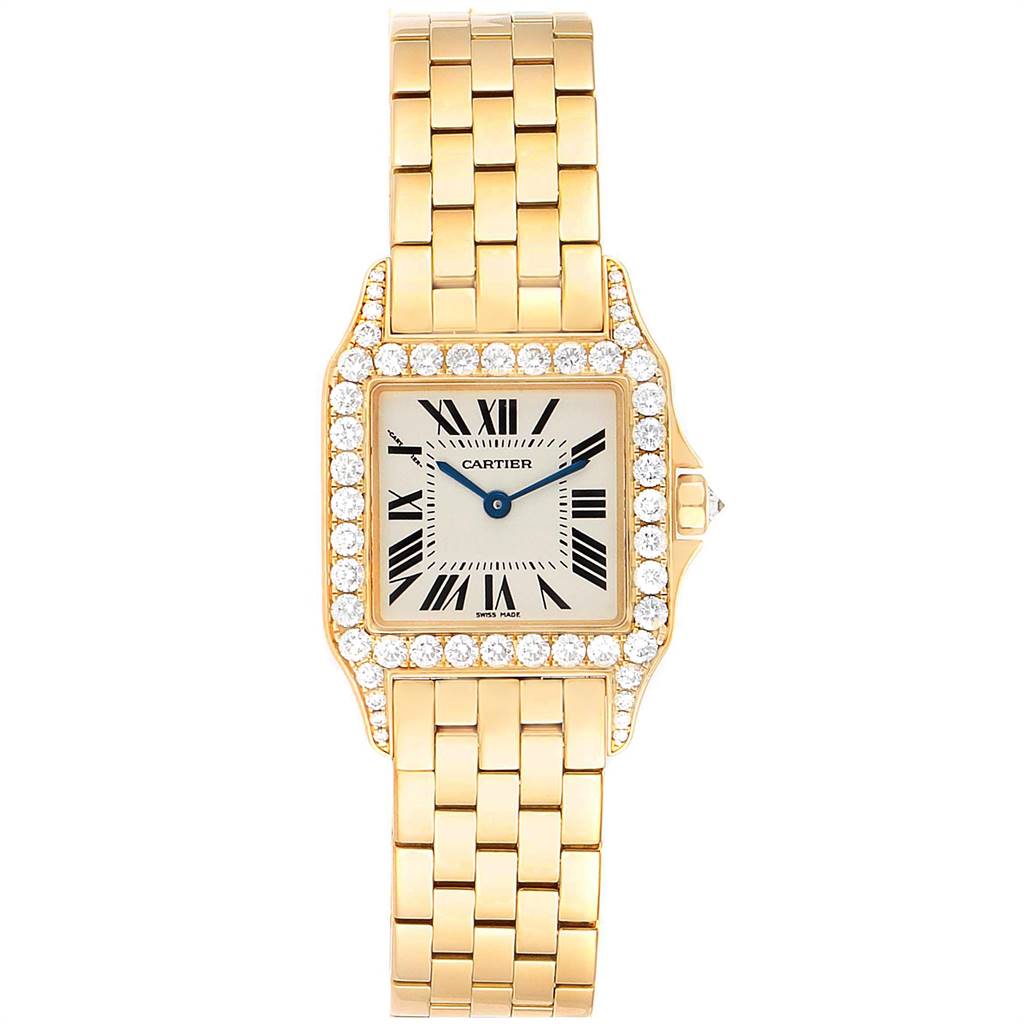 The image shows a frontal view of a Cartier Santos Demoiselle WF9002Y7 Women
s Yellow Gold Silver Dial WF9002Y7 Women
s Yellow Gold Silver Dial watch, highlighting its gold bracelet, diamond bezel, and square face.