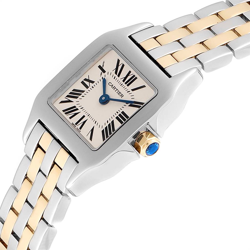 The image shows a close-up view of the Cartier Santos Demoiselle W25066Z6 Women's Steel and Gold (two tone) Silver Dial W25066Z6 Women's Steel and Gold (two tone) Silver Dial watch, focused on the face, crown, and part of the bracelet.