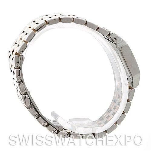 The image shows a side view of the Cartier Santos Demoiselle W25066Z6 Women's Steel and Gold (two tone) Silver Dial W25066Z6 Women's Steel and Gold (two tone) Silver Dial watch, focusing on its case and bracelet.