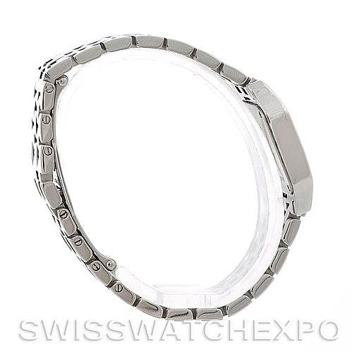 The image shows a side profile of the Santos Demoiselle model by Cartier, highlighting its metal bracelet and case thickness.