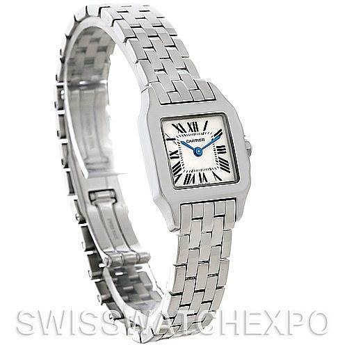 The image shows a Cartier Santos Demoiselle W25064Z5 Women
s Stainless Steel Silver Dial W25064Z5 Women
s Stainless Steel Silver Dial watch from a three-quarter angle, highlighting its bracelet and square face.