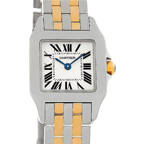 The image shows a frontal view of the Cartier Santos Demoiselle W25066Z6 Women's Steel and Gold (two tone) Silver Dial W25066Z6 Women's Steel and Gold (two tone) Silver Dial watch, featuring a two-tone strap and Roman numerals on the dial.