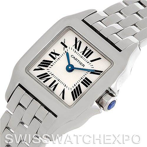 The image shows a Cartier Santos Demoiselle W25064Z5 Women's Stainless Steel Silver Dial W25064Z5 Women's Stainless Steel Silver Dial watch from a top angle, highlighting its face, bezel, and partial bracelet.