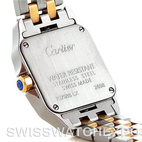 The image shows the back and part of the bracelet of a Cartier Santos Demoiselle W25066Z6 Women's Steel and Gold (two tone) Silver Dial W25066Z6 Women's Steel and Gold (two tone) Silver Dial watch in a close-up angle.