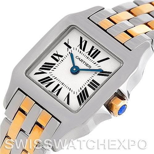 The image shows a close-up of the Cartier Santos Demoiselle W25066Z6 Women's Steel and Gold (two tone) Silver Dial W25066Z6 Women's Steel and Gold (two tone) Silver Dial watch, highlighting the face, bezel, and part of the two-tone bracelet.
