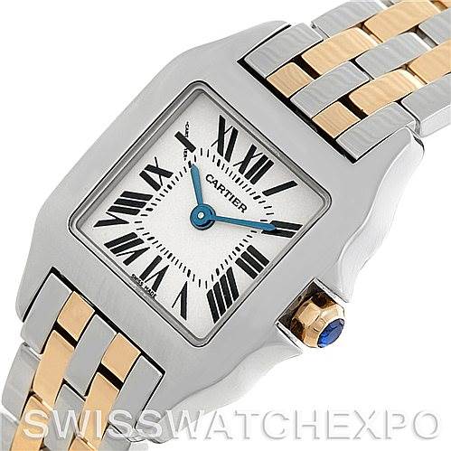 The image shows a close-up of the dial, bezel, and part of the bracelet of the Cartier Santos Demoiselle W25066Z6 Women's Steel and Gold (two tone) Silver Dial W25066Z6 Women's Steel and Gold (two tone) Silver Dial watch.