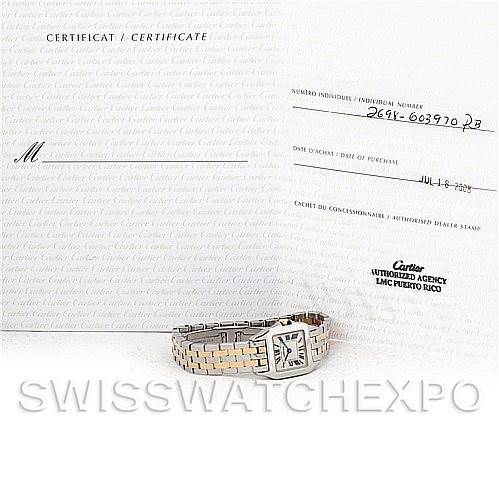 The image shows a Cartier Santos Demoiselle W25066Z6 Women's Steel and Gold (two tone) Silver Dial W25066Z6 Women's Steel and Gold (two tone) Silver Dial watch along with its certificate of authenticity.