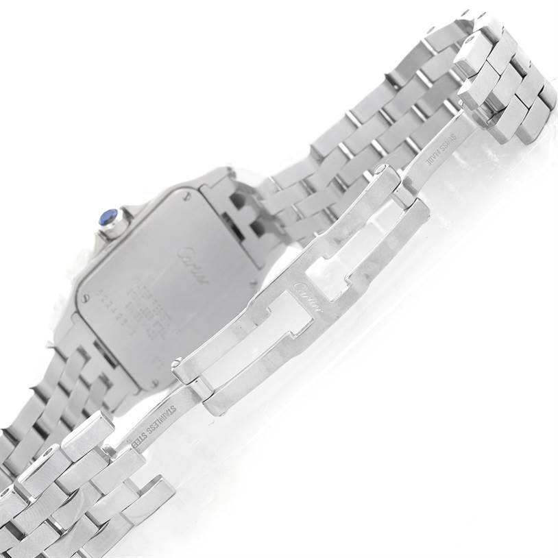 The image shows the back side and clasp of the Santos Demoiselle watch by Cartier.