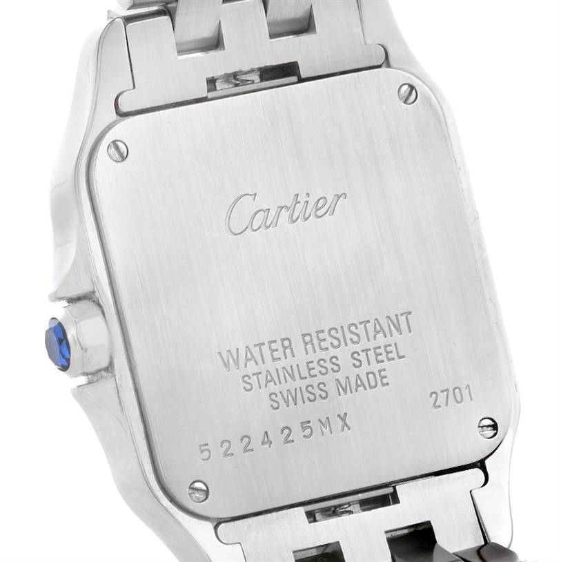 The image shows the back case of the Santos Demoiselle model by Cartier, highlighting its markings and detailing.