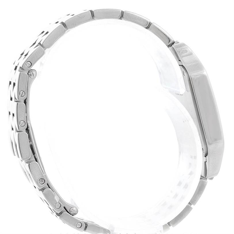 The image shows a side view of the Santos Demoiselle model by Cartier, focusing on the metal bracelet and the case side.
