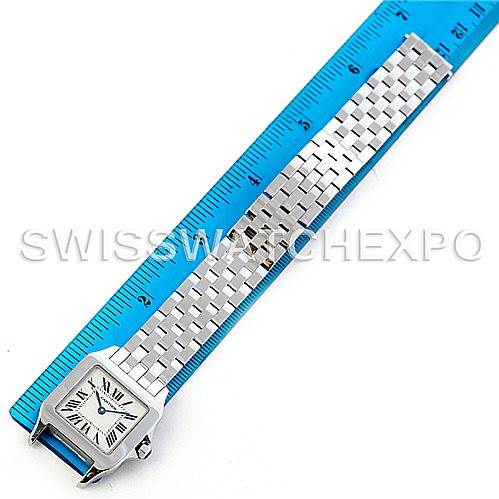 The image shows a Cartier Santos Demoiselle W25065Z5 Women's Steel and Gold (two tone) Silver Dial W25065Z5 Women's Steel and Gold (two tone) Silver Dial watch, including its face and full metal bracelet, positioned next to a blue ruler.