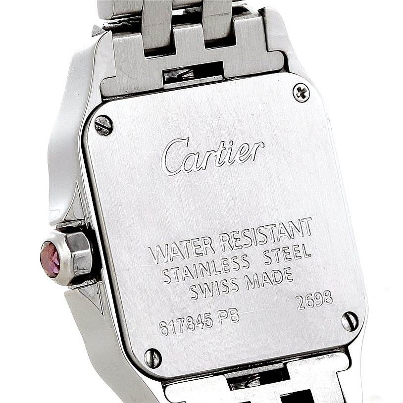 The image shows the back case and part of the bracelet of a Cartier Santos Demoiselle W25075Z5 Women's Stainless Steel Mother of Pearl Dial W25075Z5 Women's Stainless Steel Mother of Pearl Dial watch from an angle focusing on the engravings.