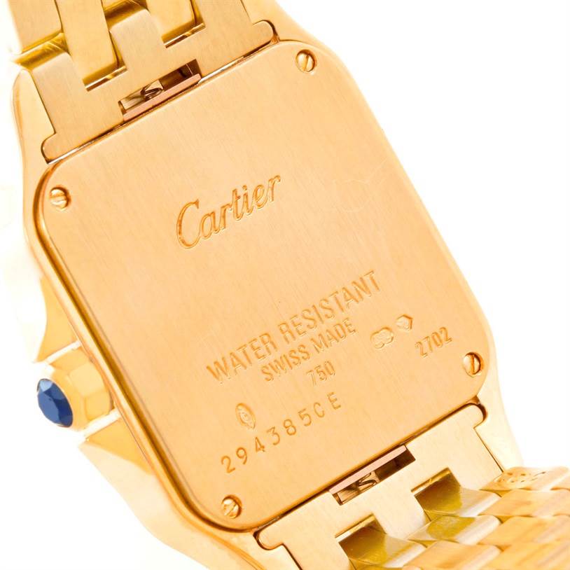 The image shows the backside of the Santos Demoiselle model by Cartier, highlighting the case back and part of the bracelet.