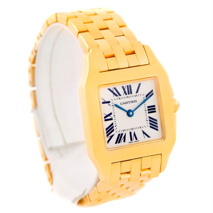 This image shows a Cartier Santos Demoiselle W25062X9 Women
s Yellow Gold Silver Dial W25062X9 Women
s Yellow Gold Silver Dial watch from a three-quarter angle, highlighting the face, bracelet, and crown.