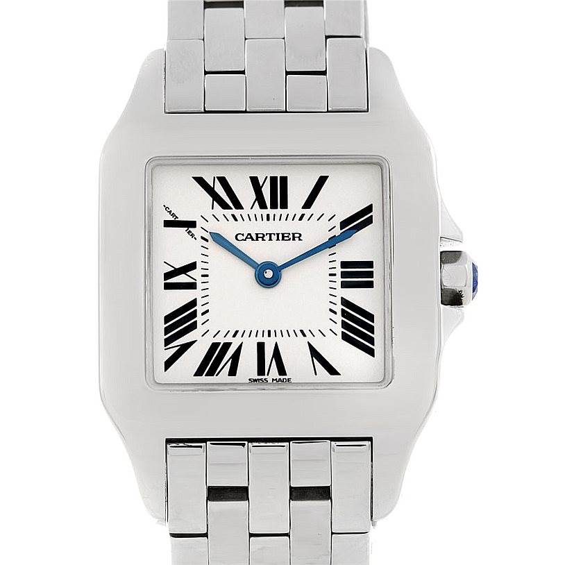 This image shows a front view of the Cartier Santos Demoiselle W25065Z5 Women
s Stainless Steel Silver Dial W25065Z5 Women
s Stainless Steel Silver Dial watch, highlighting its dial, Roman numerals, and part of the bracelet.