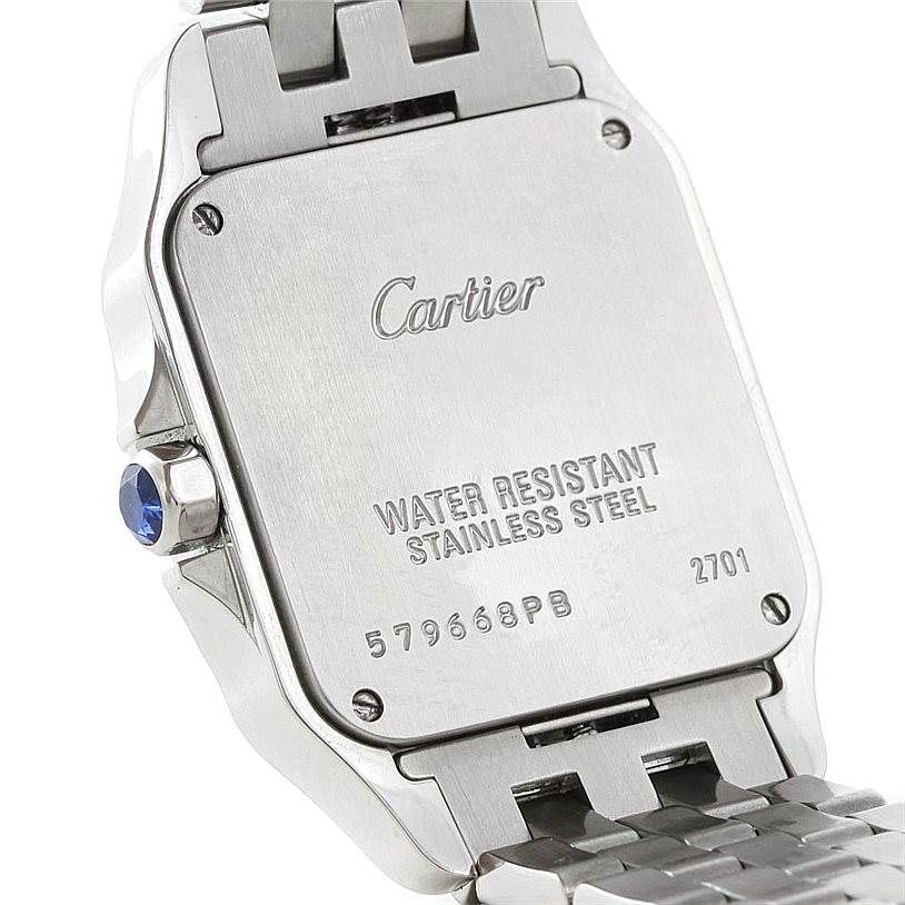 This image shows a close-up of the back case and part of the bracelet of a Cartier Santos Demoiselle W25065Z5 Women
s Stainless Steel Silver Dial W25065Z5 Women
s Stainless Steel Silver Dial watch.