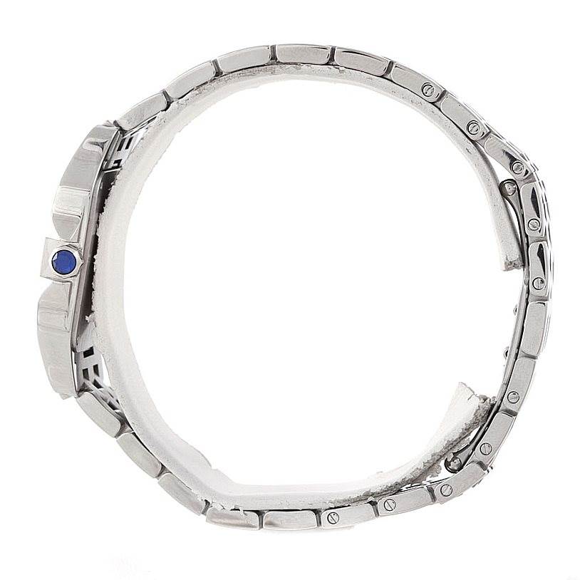 The image shows a side view of the Cartier Santos Demoiselle W25065Z5 Women
s Stainless Steel Silver Dial W25065Z5 Women
s Stainless Steel Silver Dial watch, highlighting its case, crown, and metal bracelet.