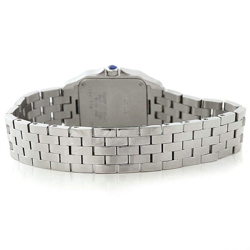 The image shows the back view of the Santos Demoiselle model by Cartier, highlighting the stainless steel bracelet and case back.