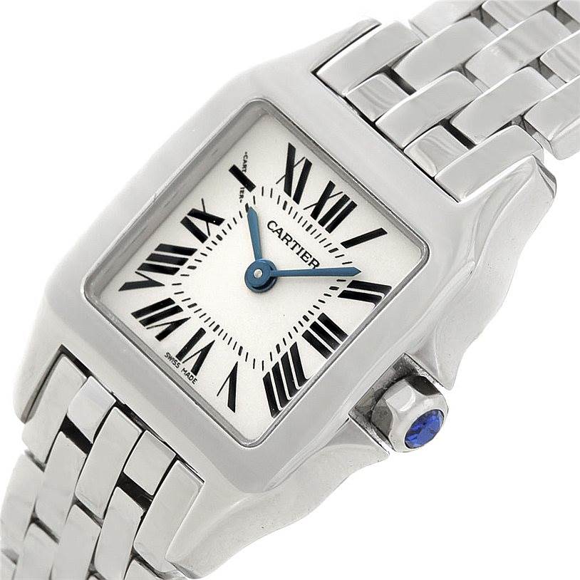 This image shows a close-up of the Cartier Santos Demoiselle W25064Z5 Women's Stainless Steel Silver Dial W25064Z5 Women's Stainless Steel Silver Dial watch, highlighting the face, bezel, crown, and part of the bracelet.