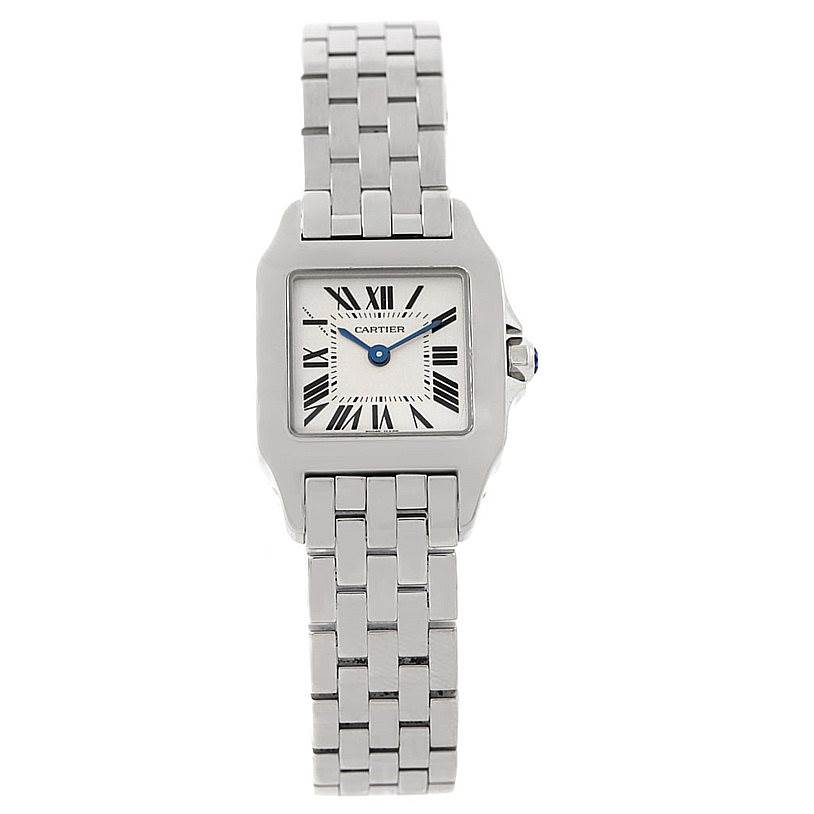 The image shows a front view of a Cartier Santos Demoiselle W25064Z5 Women
s Stainless Steel Silver Dial W25064Z5 Women
s Stainless Steel Silver Dial watch, displaying its square face and metal bracelet.