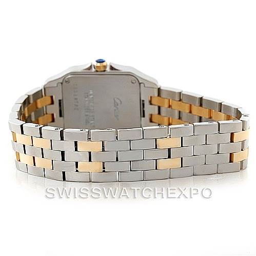 The image shows the back case and part of the two-tone bracelet of the Santos Demoiselle model by Cartier.