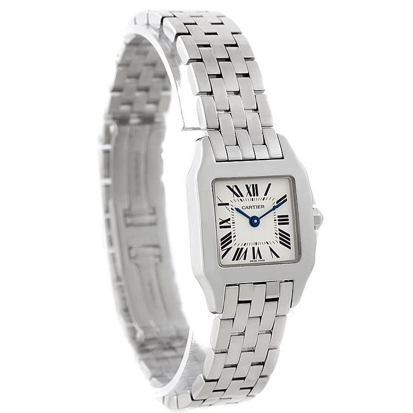 The image shows a front angle of a Cartier Santos Demoiselle W25064Z5 Women's Stainless Steel Silver Dial W25064Z5 Women's Stainless Steel Silver Dial watch, highlighting its face and silver bracelet.