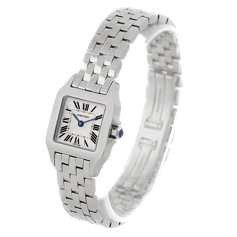 The image shows a Cartier Santos Demoiselle W25064Z5 Women's Stainless Steel Silver Dial W25064Z5 Women's Stainless Steel Silver Dial watch at a three-quarter angle displaying its face and stainless steel bracelet.