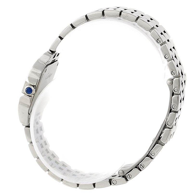 The image shows a side profile of the Santos Demoiselle watch by Cartier, highlighting its metal bracelet and crown.