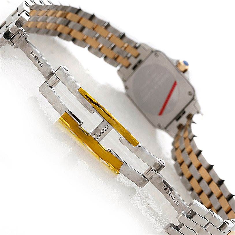 This image shows the clasp and partial bracelet of the Cartier Santos Demoiselle W25066Z6 Women's Steel and Gold (two tone) Silver Dial W25066Z6 Women's Steel and Gold (two tone) Silver Dial watch from an underside angle.