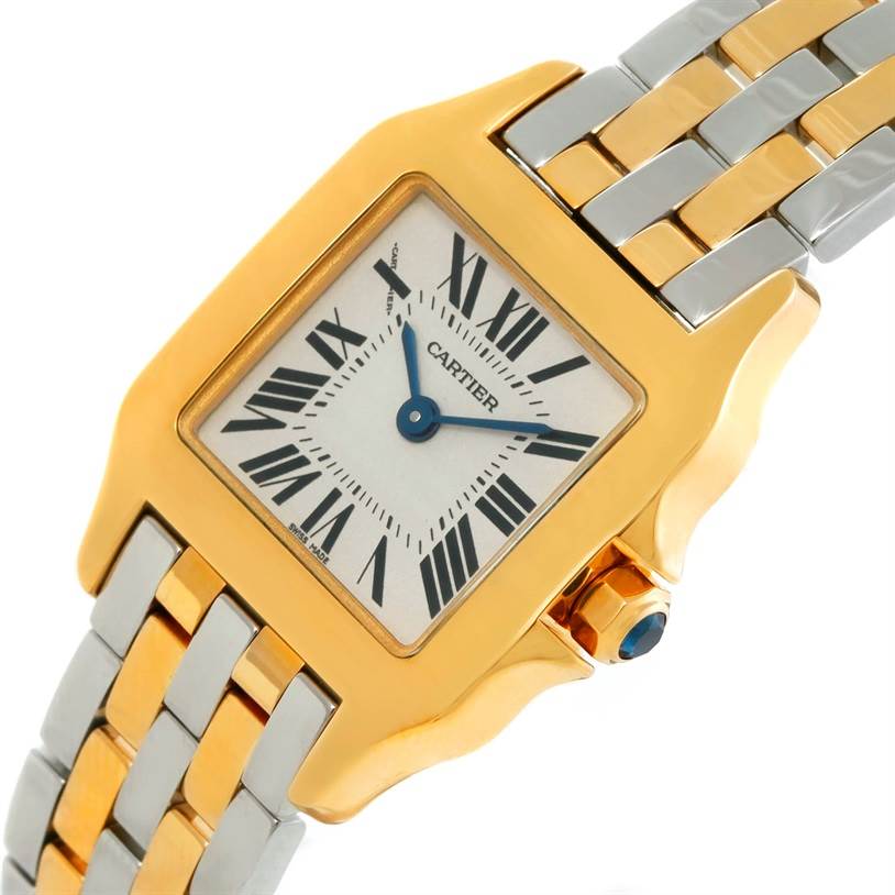 The Cartier Santos Demoiselle W25063Z6 Women's Yellow Gold Silver Dial W25063Z6 Women's Yellow Gold Silver Dial wristwatch is shown from an angled close-up, highlighting the Roman numeral dial, blue hands, and two-tone bracelet.