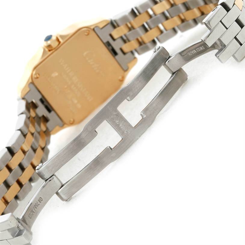 The image shows the back case and clasp of the Cartier Santos Demoiselle W25063Z6 Women's Yellow Gold Silver Dial W25063Z6 Women's Yellow Gold Silver Dial watch at an angled view.