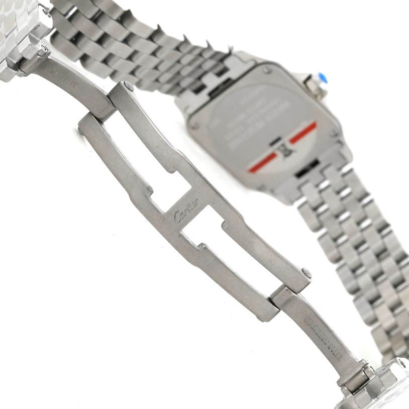 The image shows the back and clasp of the Santos Demoiselle model watch by Cartier, highlighting the metal bracelet and clasp mechanism.