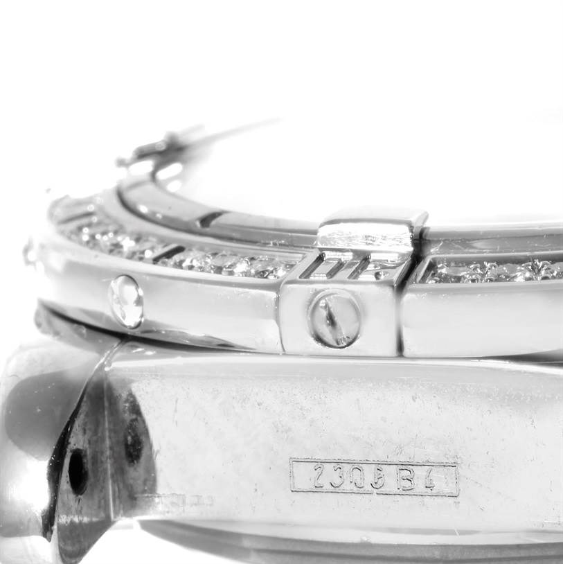 The image shows a close-up, side view of the bezel and part of the case of the Breitling A71356 Women's Stainless Steel Mother of Pearl Dial A71356 Women's Stainless Steel Mother of Pearl Dial Windrider Cockpit Ladies Mother Pearl Diamond Watch A71356.